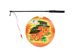 Obrázek produktu: Lampion Halloween kulatý - veselé dýně 25 cm se svítící hůlkou